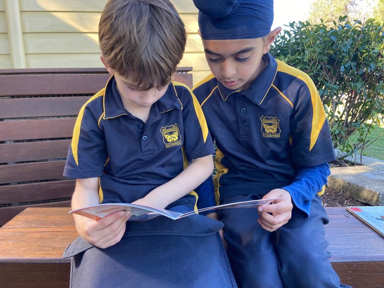 Boys taking part in Buddy Reading