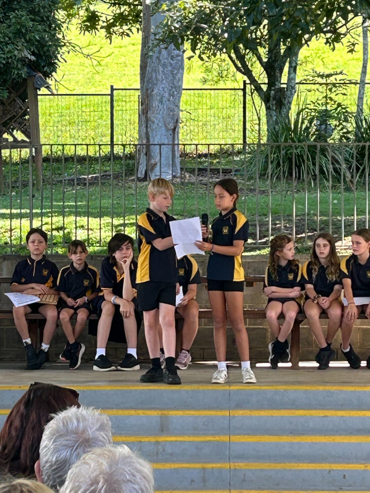Stage 3 students presenting their learning during a Sharing Assembly