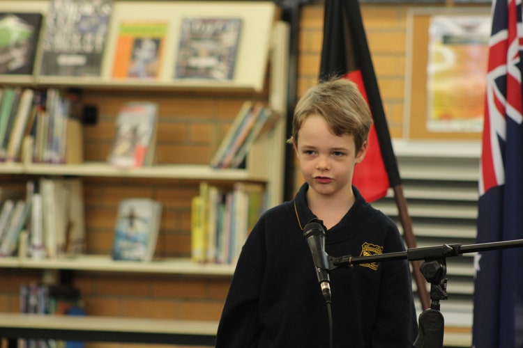 A K-2 student reciting a poem off-by-heart as part of the Bongil Bongil Public Speaking event